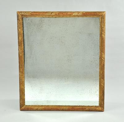 A Large Decorative Framed Mirror