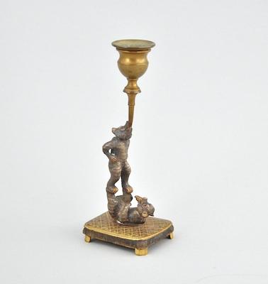 A Whimsical Figural Candleholder