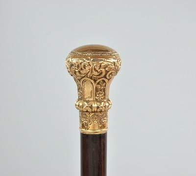 A Walking Stick with Decorative Knob