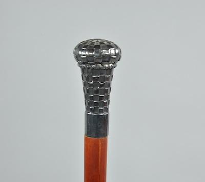 A Walking Stick with Sterling Silver