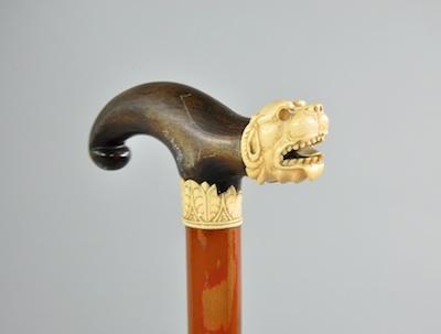 A Walking Cane with Decorative Handle