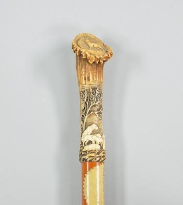 A Mallacca Stick with a Carved