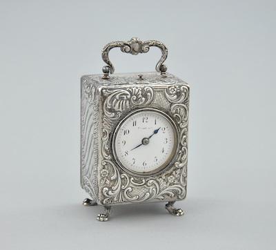 A Silver Cased Travel Clock From b4fc0