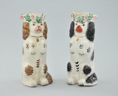 A Pair of Staffordshire Begging