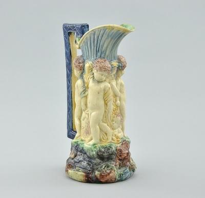 A Majolica Cherub Pitcher Charmingly