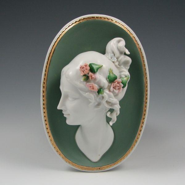 Porcelain wall plaque with woman with