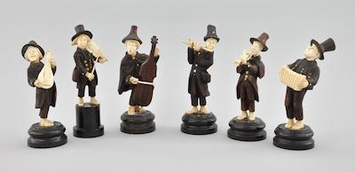 Six Carved Wood and Bone Figurines of