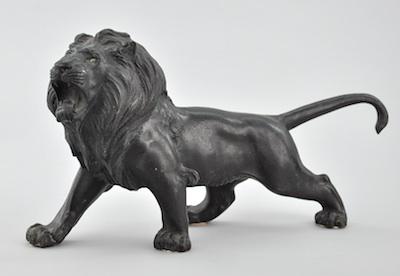 A Bronze Figurine of a Lion Cast