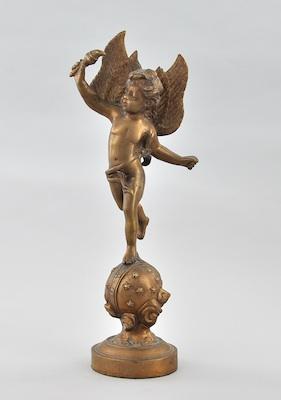 A Bronze Figure of a Putto The