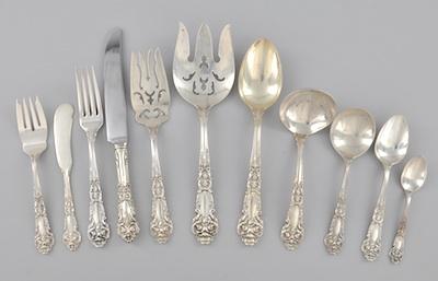 A Sterling Silver Dinner Service For