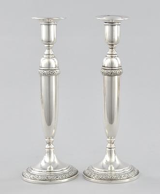 A Pair of Weighted Sterling Silver Candlesticks