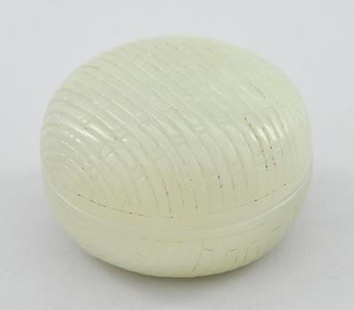 A Round Carved Jade Box A lidded