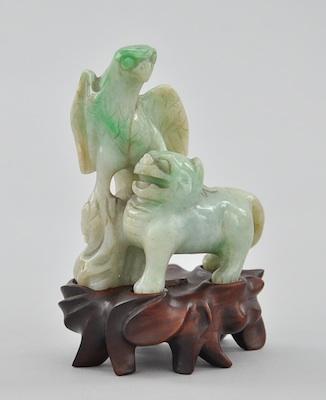 A Carved Jadeite Lion and Bird Figure