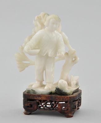 A Chinese Carved Milky Grey Jade Depicting