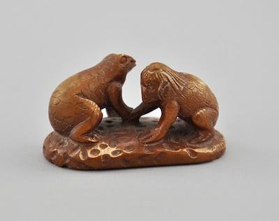 A Carved Kappa Boy and Frog Ivory b5c50