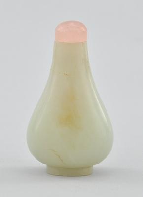 A Carved White Jade Snuff Bottle