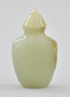 A Carved Green Jade Snuff Bottle