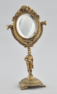 A Decorative Cast Brass Figurative