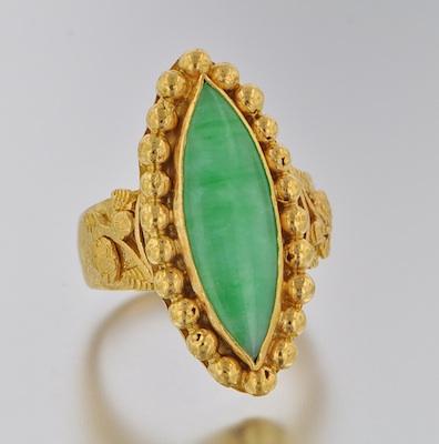 A High Karat Gold and Jade Ring b5a44