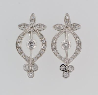 A Pair of Delicate Diamond Earrings