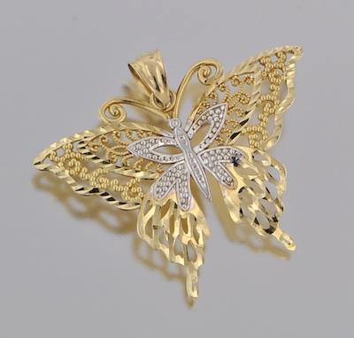 A Two-Tone Gold Butterfly Pendant