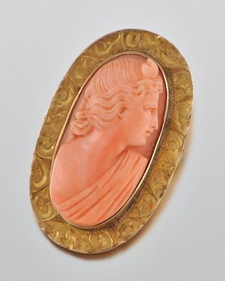 A Carved Coral Cameo in Gold Frame b5a92