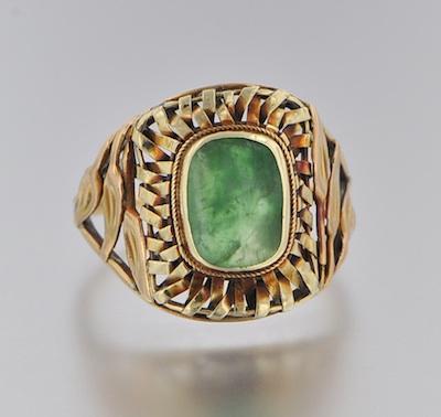 An Arts & Crafts Gold and Jadeite Ring