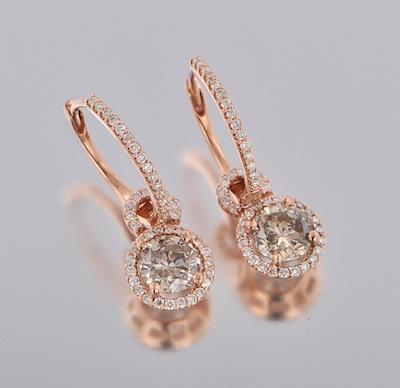 A Pair of Diamond Earrings 14k