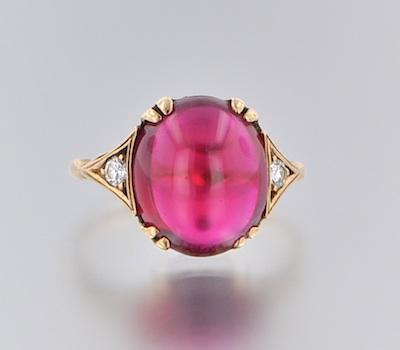 A Ladies Synthetic Ruby Cabochon and