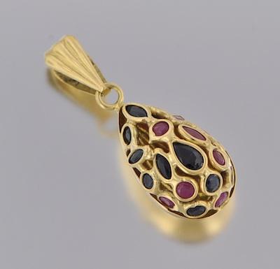 An 18k Gold, Ruby and Sapphire