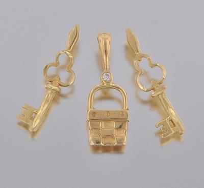 Three 14k Gold Charms Containing: