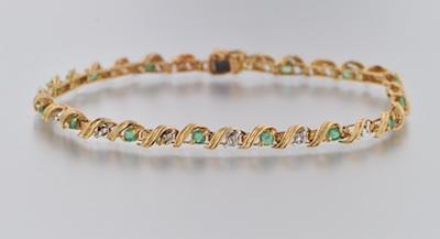 A Ladies' Diamond and Emerald Bracelet
