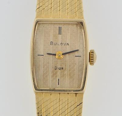 A Ladies 14k Gold Bulova Dior Dress