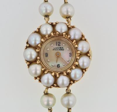 A Ladies' Pearl and Gold Lucien