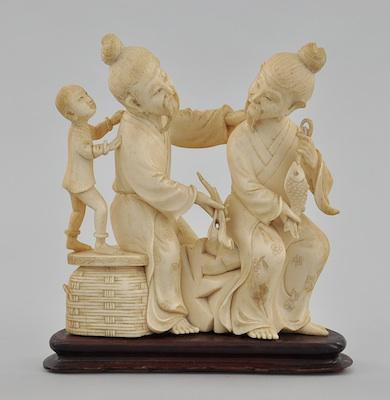 Carved Ivory Figural Group of Seated