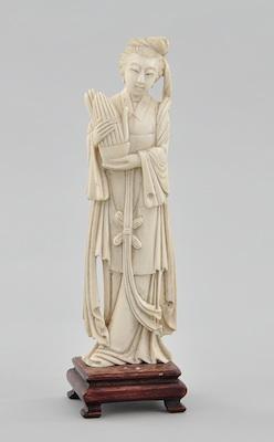 A Carved Ivory Figure of an Attendant b5b9f