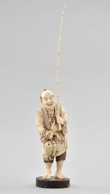 A Carved Ivory Figurine of a Fisherman b5ba5