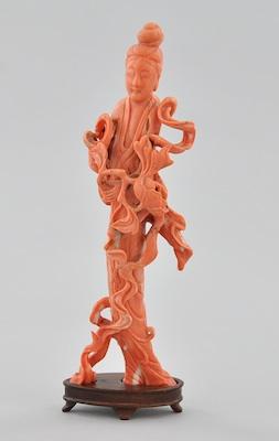 A Carved Coral Quan Yin with Wood b5bb3