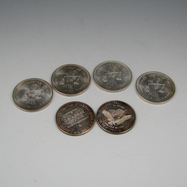 Six (6) troy ounces of silver including