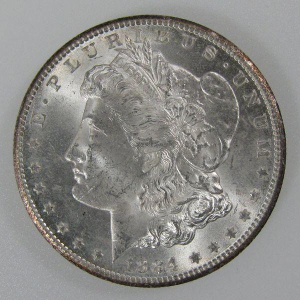 1884-CC Morgan silver dollar in