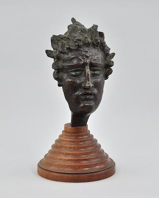 A Cast Bronze Mask of Apollo The b63a8