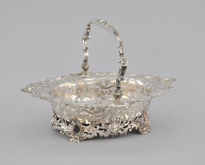 An Elaborate Silver Cake Basket, From
