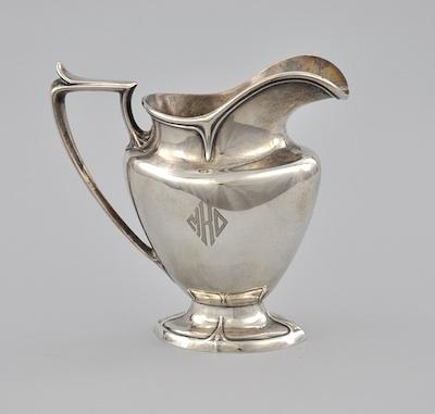 A Small Sterling Pitcher by Durgin Elegant
