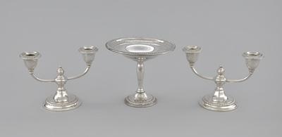 A Pair of Weighted Silver Candlesticks b6418