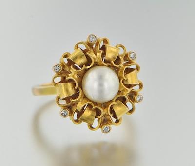 A Ladies Pearl and Diamond Ring b64c3