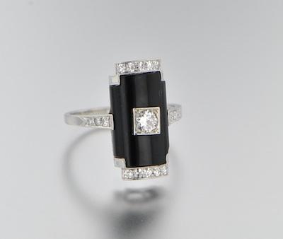 An Art Deco Platinum Diamond and b64e2