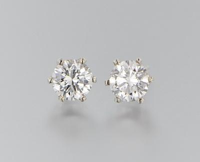 A Pair of Diamond Stud Earrings b64e3