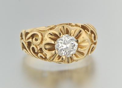 A Gold and Solitaire Diamond Ring