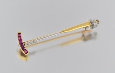 An 18k Gold and Ruby Polo Mallet b6569