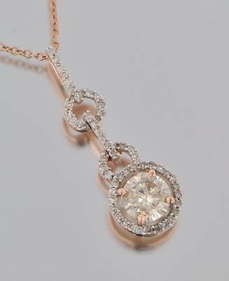 A Rose Gold and Diamond Pendant b6575